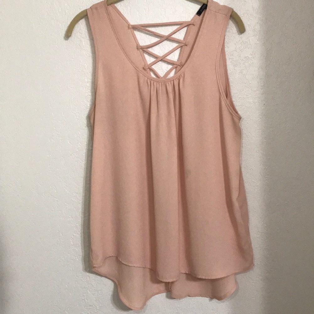 Light pink blouse with cross cross back detail